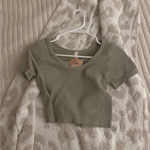 light green cropped top